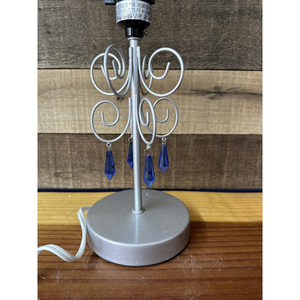 Silver Scroll Lamp With Blue Dangling Prisms